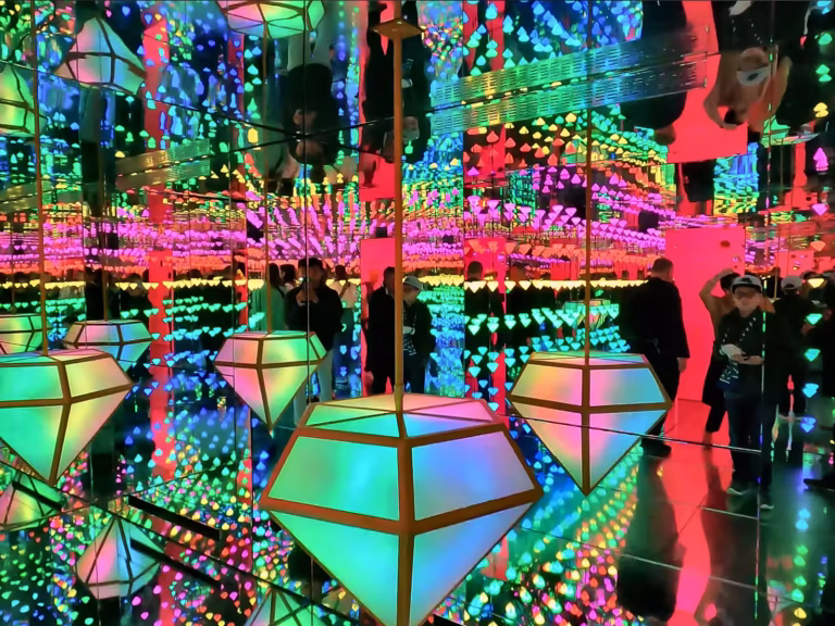 The vibrant and colorful reflections in the Moco museum create a mesmerizing experience with geometric decorations